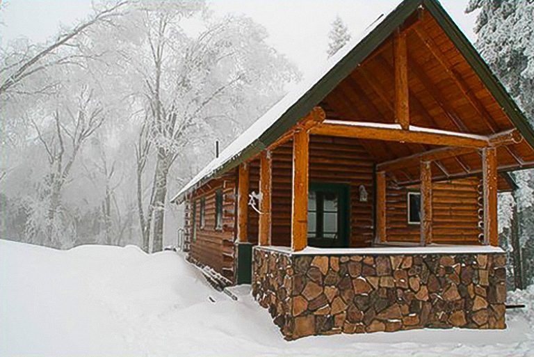 02_Back of Cabin in Snow Storm